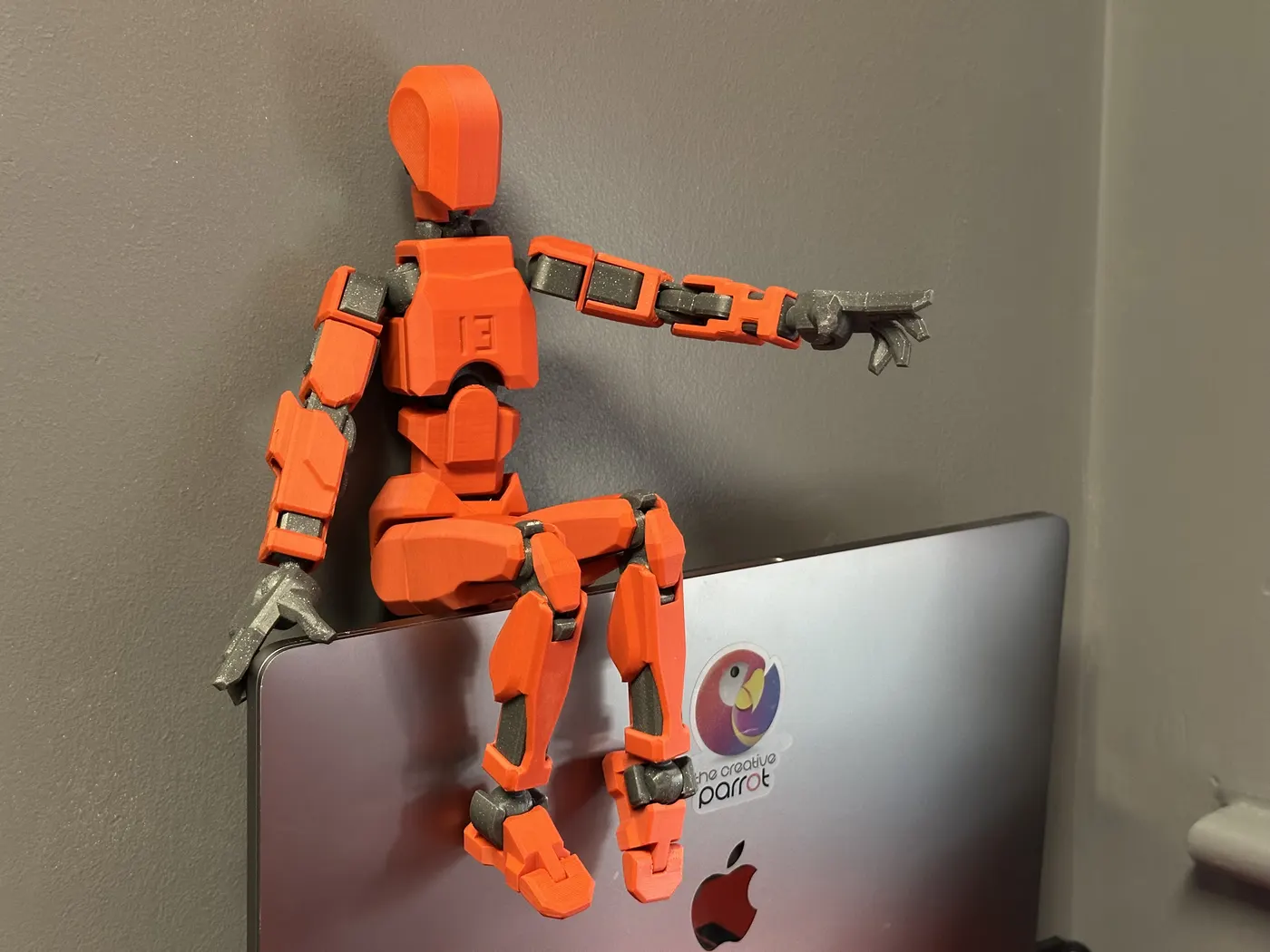 Orange articulated 3D printed figure