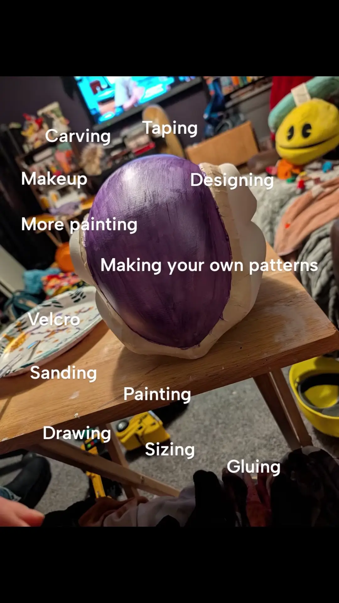 The printed helmet on Mariah’s worktable with the dome painted metallic purple