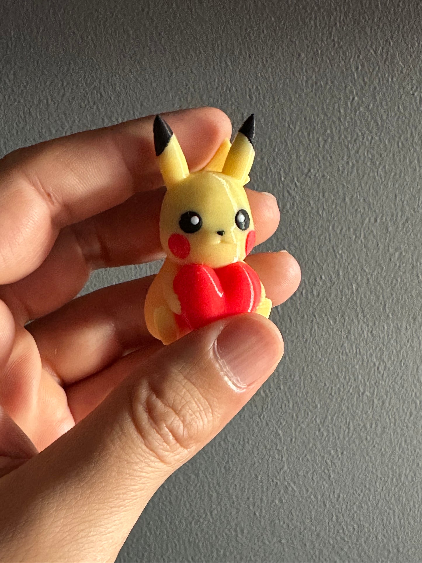 Multi-Color 3D Printed Pikachu with Heart – Vibrant Collectible Figure